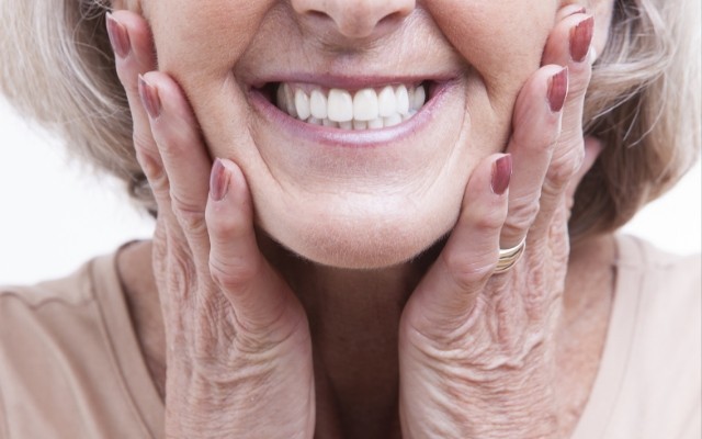 Woman with dental implants in Chaska