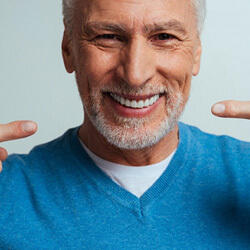 man smiling after treatment