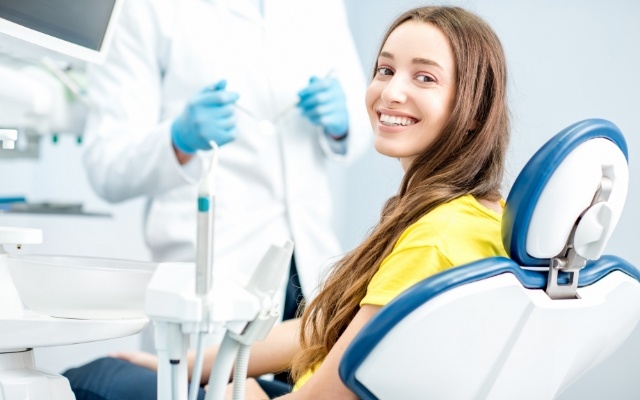 Woman smiling during dental checkup