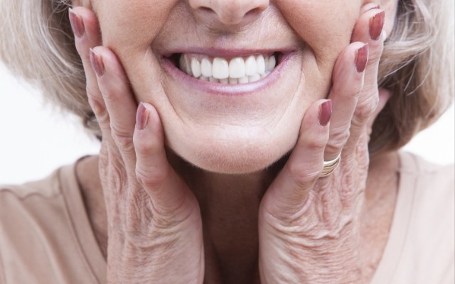 Woman with dental implants in Chaska