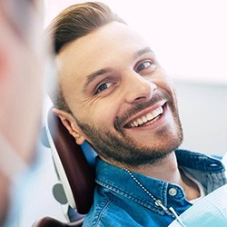 Man wears dental implants in Chaska
