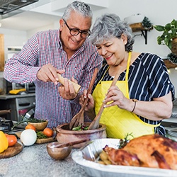 Older couple cooking in the kitchen