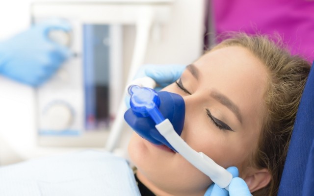 Dental patient receiving nitrous oxide sedation dentistry