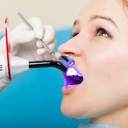 Dental patient receiving dental bonding