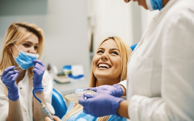 Dentist and dental patient discussing CEREC dentistry