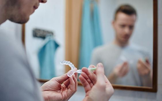 Man performing a touch-up at home