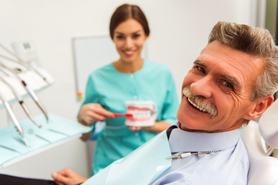 Smiling man with dentures