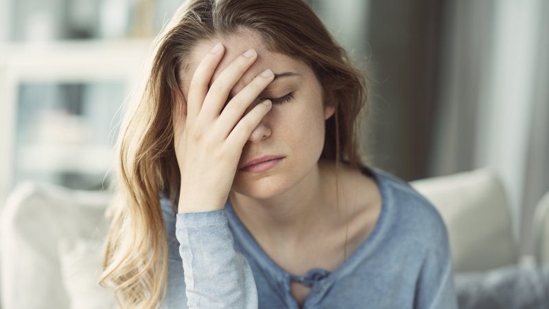 young woman feeling stress and exhausted