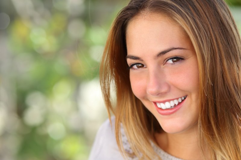 woman smiling with whiter teeth