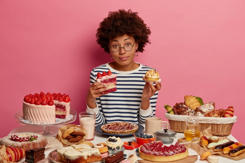 woman surrounded by sweets